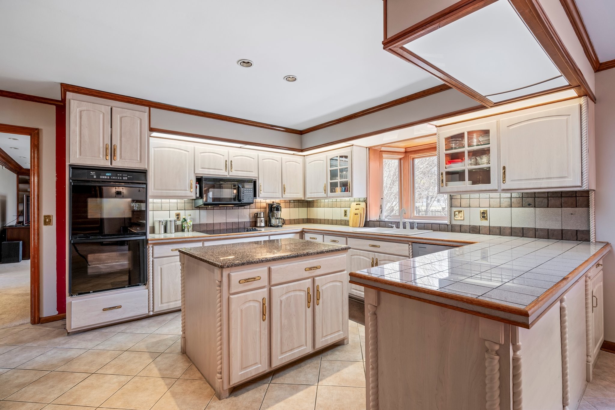 6375 Chickering Circle Nashville, TN 37215 - Photo 25 of 59 a kitchen with stainless steel appliances granite countertop a stove a sink and a refrigerator