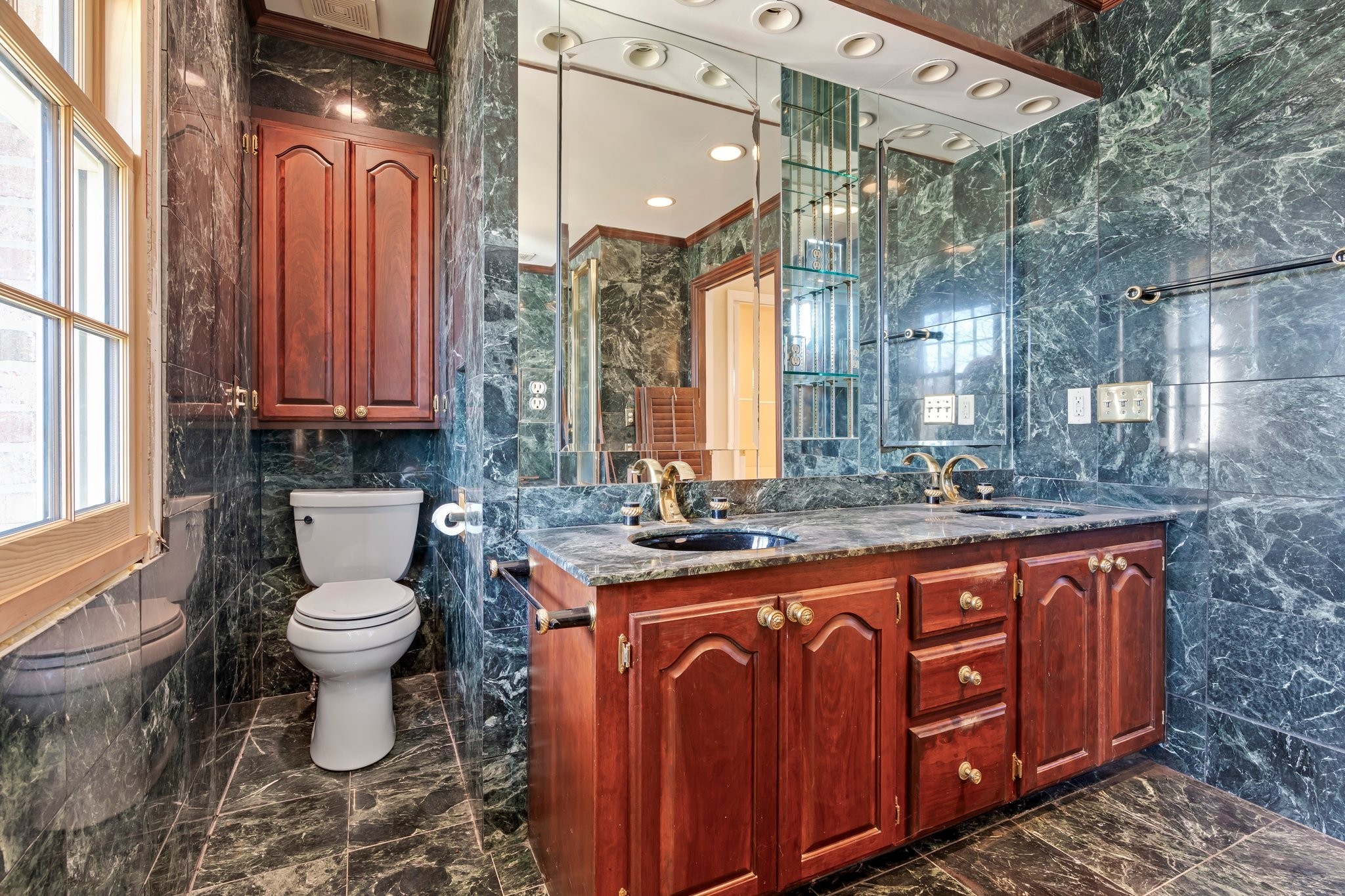 6375 Chickering Circle Nashville, TN 37215 - Photo 42 of 59 a bathroom with a granite countertop toilet sink and mirror