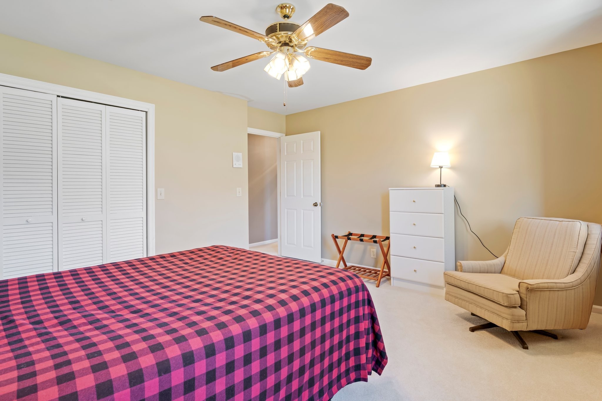 6375 Chickering Circle Nashville, TN 37215 - Photo 44 of 59 a bedroom with a bed and a chandelier