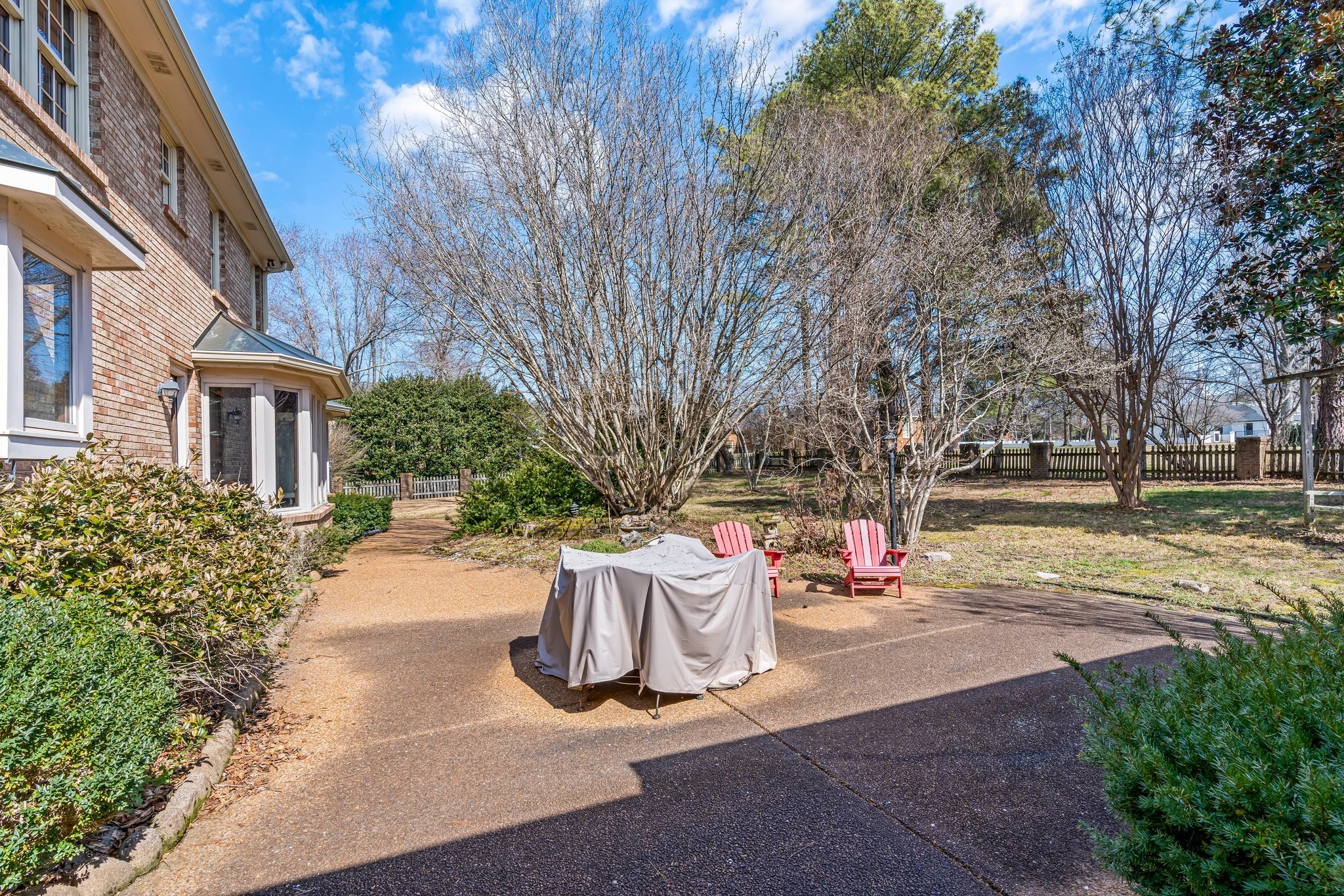 6375 Chickering Circle Nashville, TN 37215 - Photo 58 of 59 a view of a patio with table and chairs and a large tree