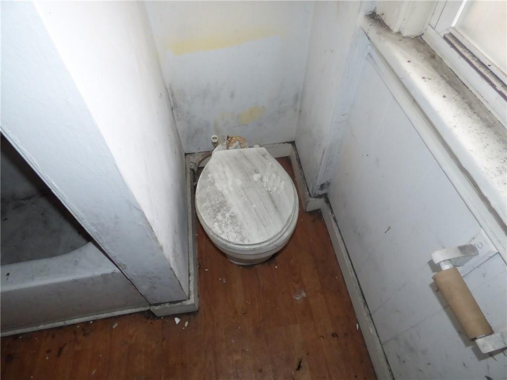 1021 Rue Grande Vue Street Pittsburgh, PA 15220 - Photo 18 of 22 view of water heater room with washer and dryer