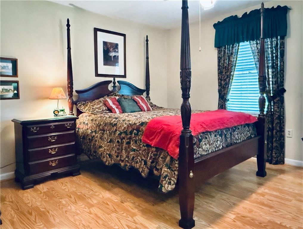 217 Cherokee Circle Cedartown, GA 30125 - Photo 20 of 25 a bedroom with a bed and window