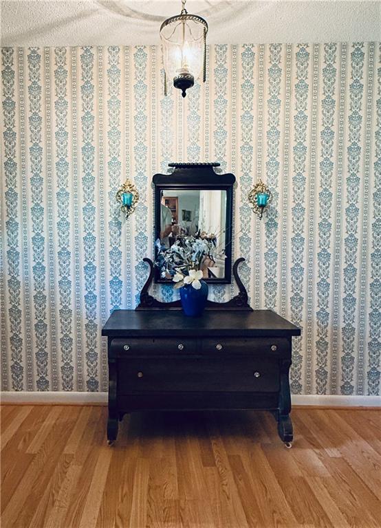 217 Cherokee Circle Cedartown, GA 30125 - Photo 23 of 25 a room with furniture and wooden floor