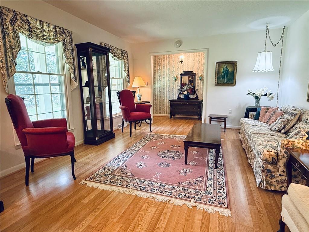 217 Cherokee Circle Cedartown, GA 30125 - Photo 9 of 25 a living room with furniture rug and wooden floor