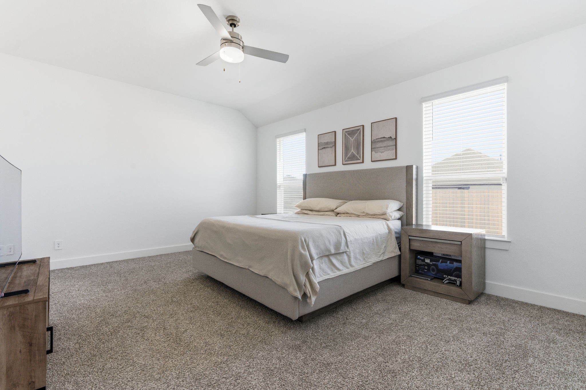 13776 Rising Sun Lane Conroe, TX 77384 - Photo 12 of 30 a bedroom with a bed and a window