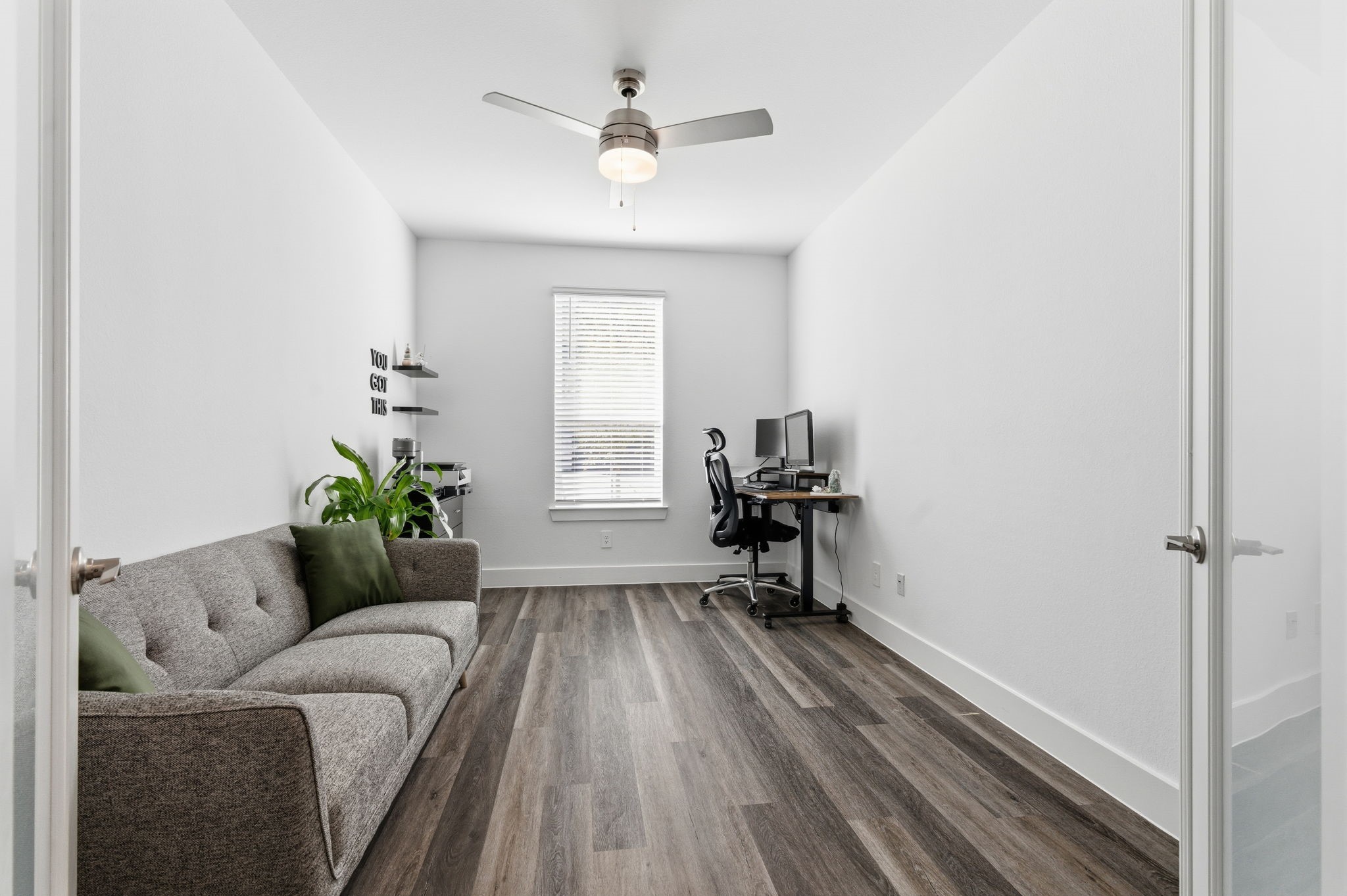 13776 Rising Sun Lane Conroe, TX 77384 - Photo 15 of 30 a living room with furniture and a window