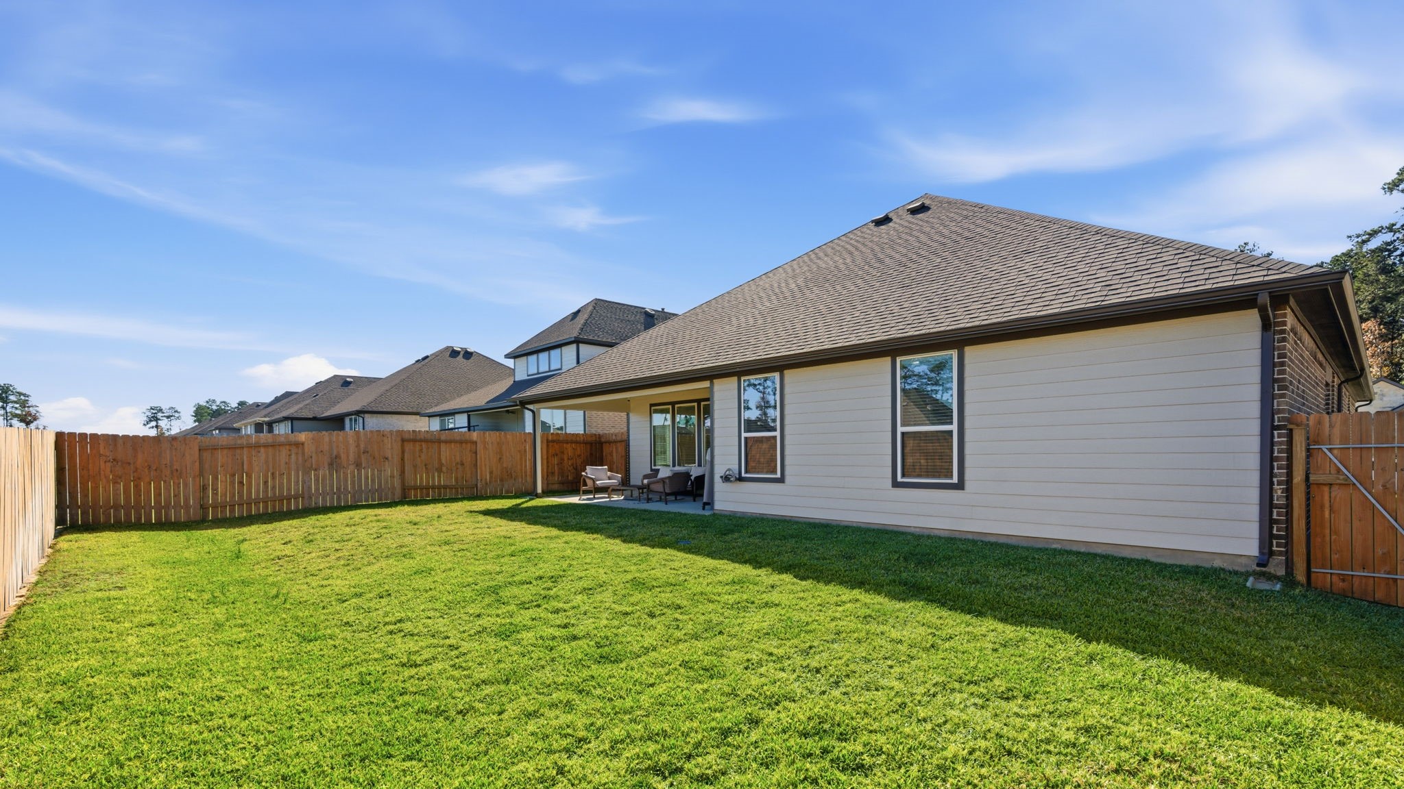 13776 Rising Sun Lane Conroe, TX 77384 - Photo 17 of 30 a view of a house with a yard and pathway