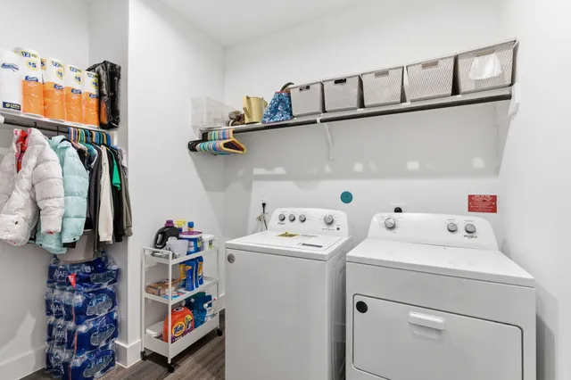 a utility room with dryer and washer