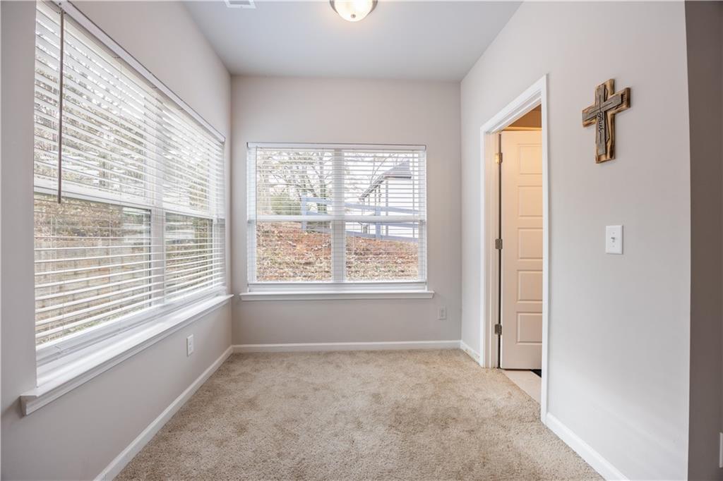 184 Ashford Lane Commerce, GA 30529 - Photo 11 of 49 a view of an empty room with a window