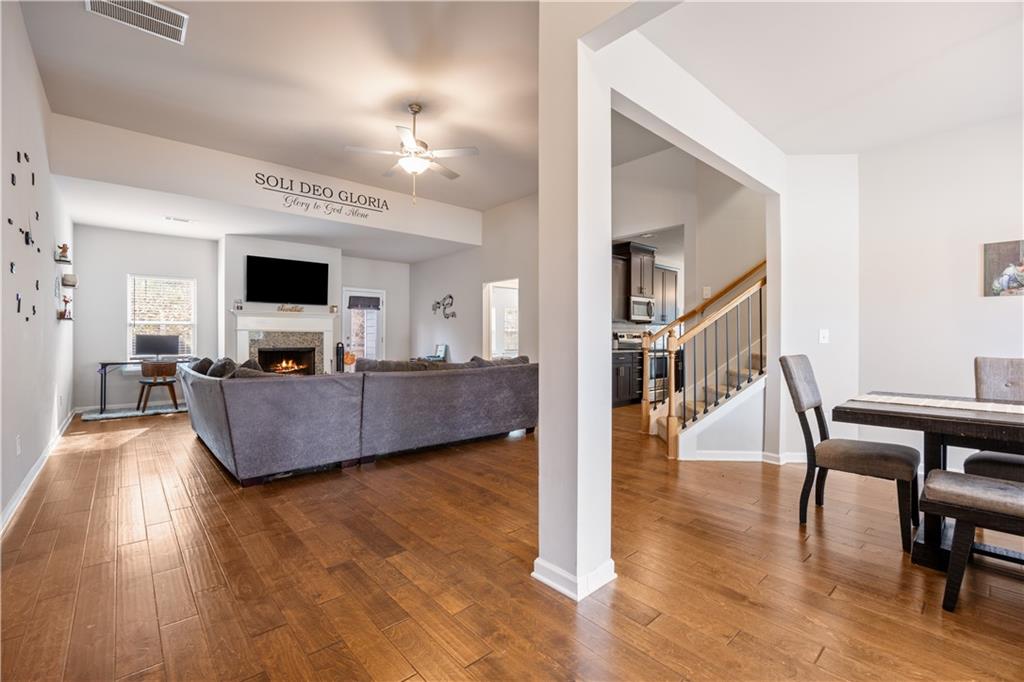 184 Ashford Lane Commerce, GA 30529 - Photo 3 of 49 a living room with furniture and a wooden floor