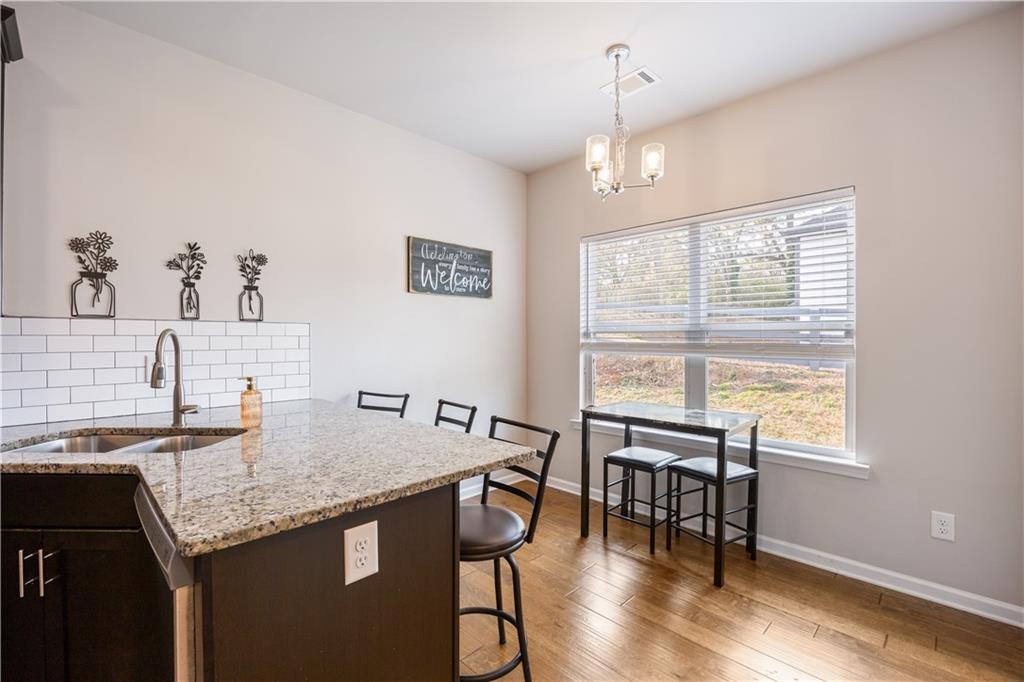 184 Ashford Lane Commerce, GA 30529 - Photo 33 of 49 a view of a dining room with furniture window and outside view