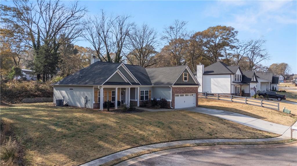 184 Ashford Lane Commerce, GA 30529 - Photo 40 of 49 front view of a house with a yard