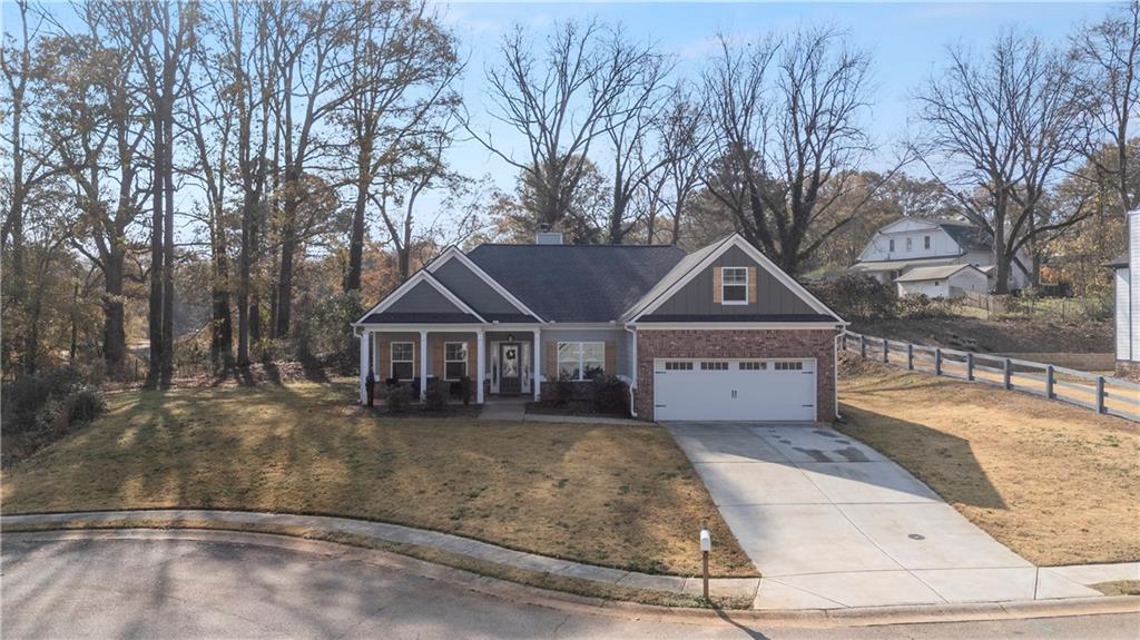 184 Ashford Lane Commerce, GA 30529 - Photo 41 of 49 front view of a house with a yard