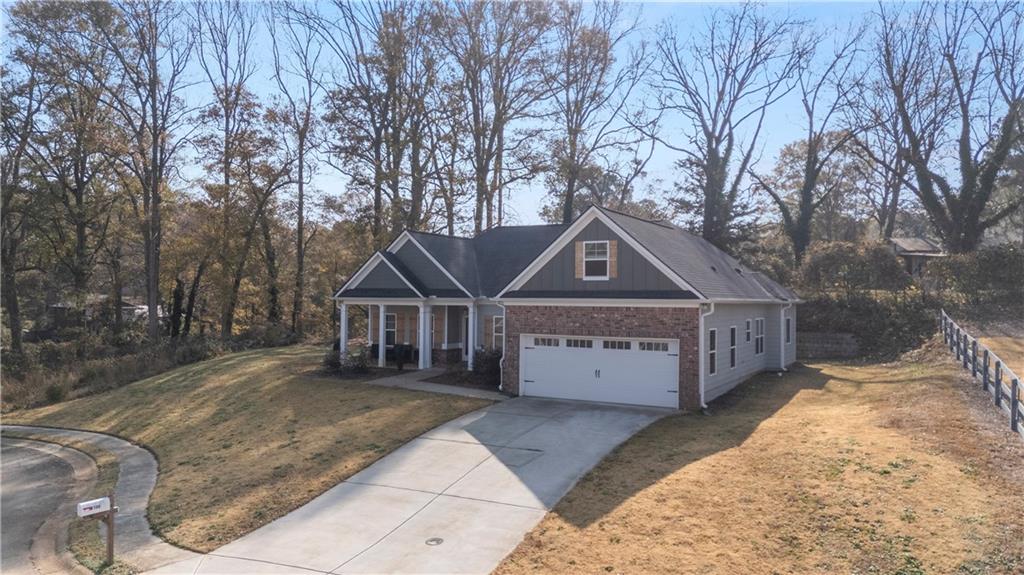 184 Ashford Lane Commerce, GA 30529 - Photo 42 of 49 front view of a house with a yard