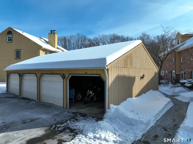 a view of entryway with wooden door