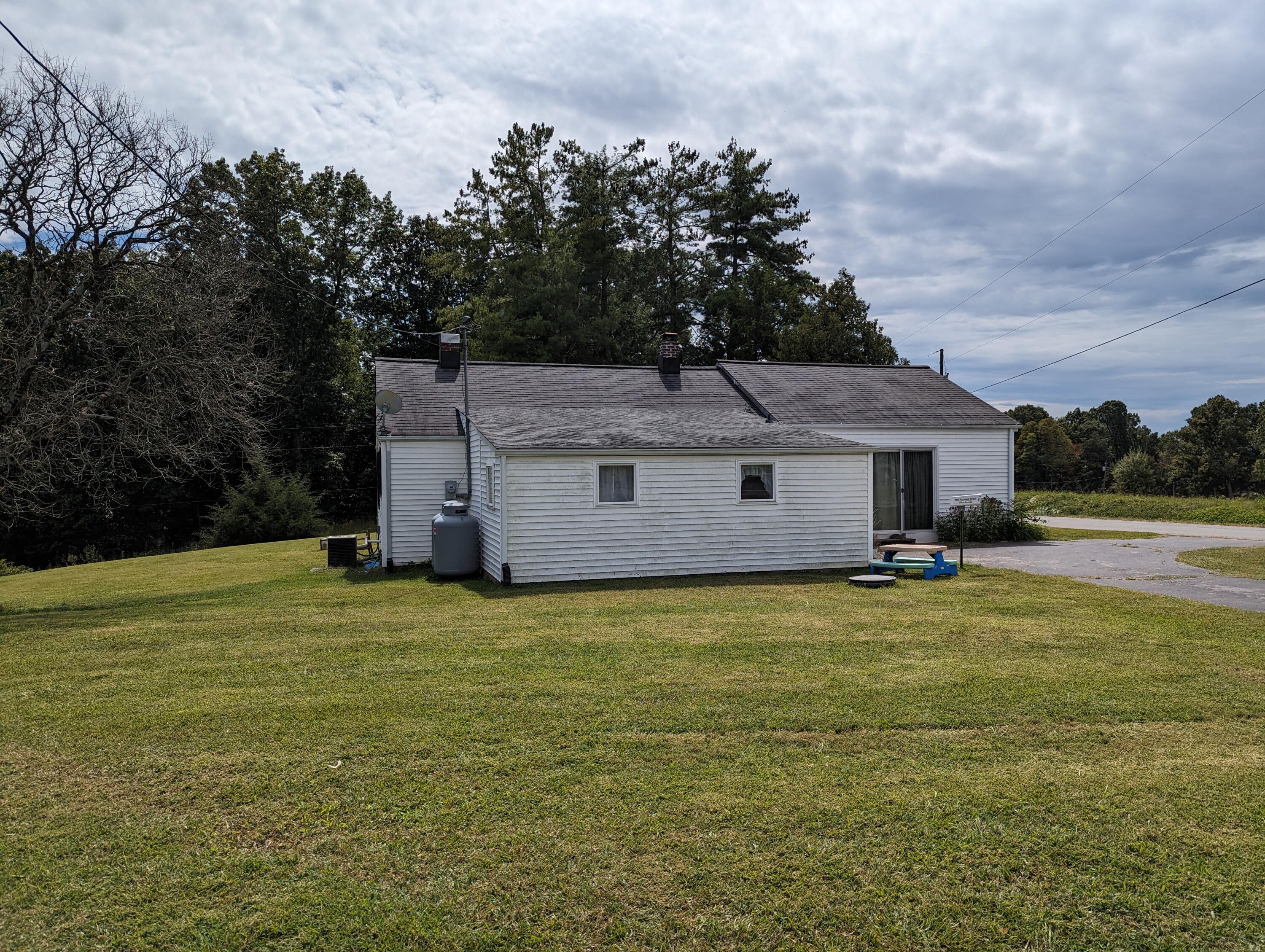 1731 Ball Park Road Rocky Mount, VA 24151 - Photo 2 of 15 a front view of a house with a yard