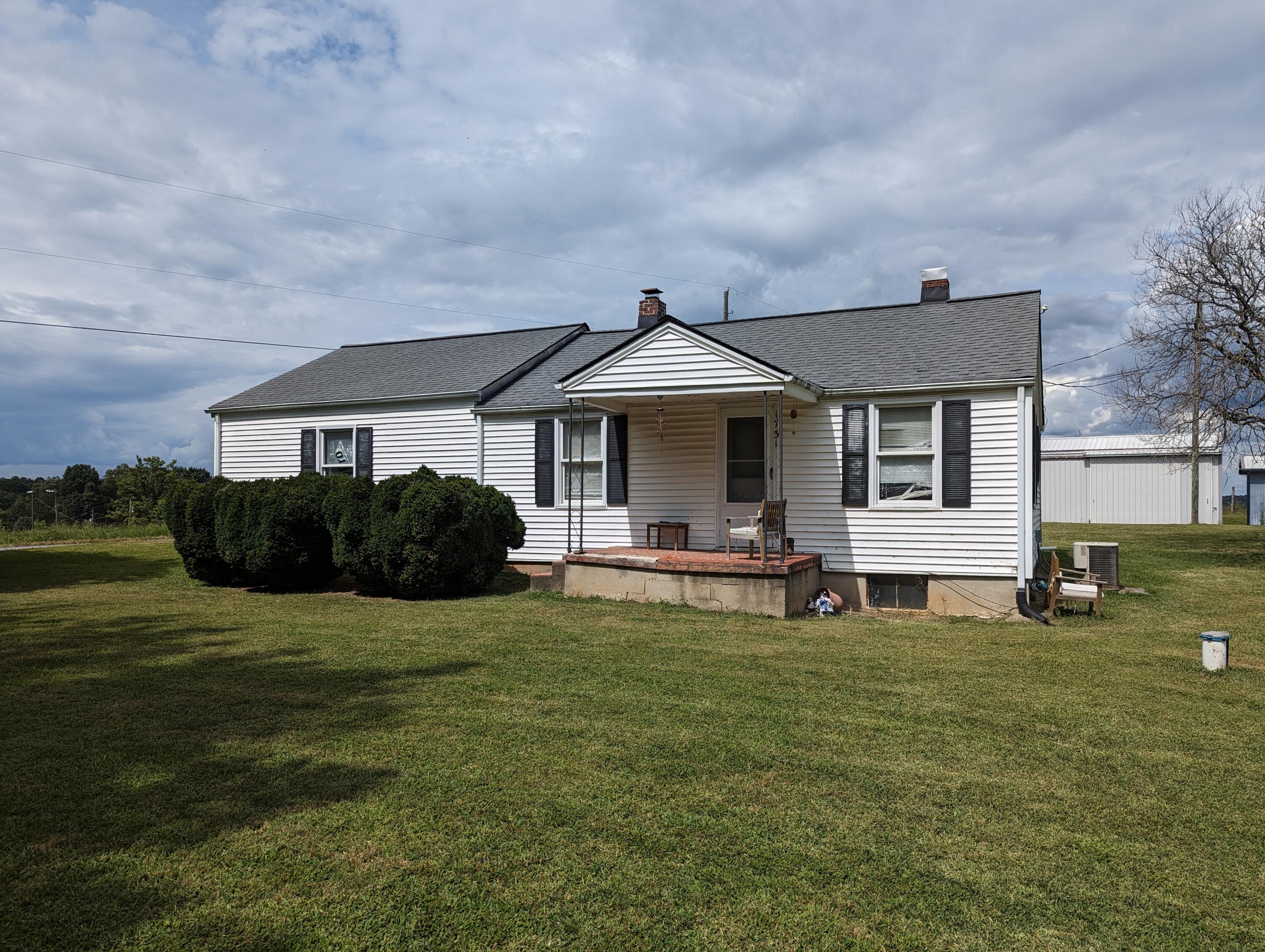 1731 Ball Park Road Rocky Mount, VA 24151 - Photo 3 of 15 a front view of a house with a garden