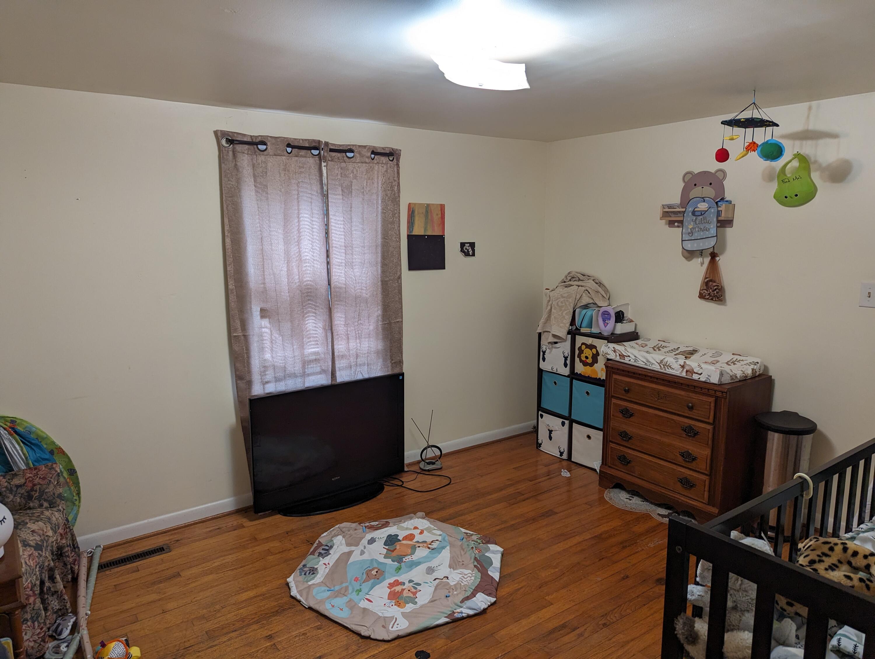 1731 Ball Park Road Rocky Mount, VA 24151 - Photo 8 of 15 a view of a workspace with furniture and wooden floor