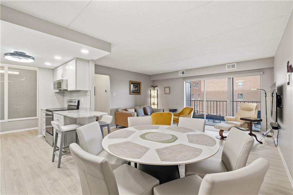 5600 Munhall Road, Unit 501 Pittsburgh, PA 15217 - Photo 14 of 37 Bright and spacious open concept layout.