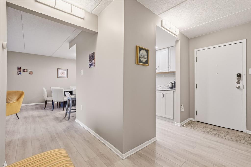 5600 Munhall Road, Unit 501 Pittsburgh, PA 15217 - Photo 7 of 37 Sleek LVP flooring and state-of-the-art updates throughout.
