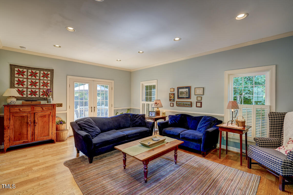 3725 Evander Way Raleigh, NC 27613 - Photo 15 of 35 a living room with furniture and a window
