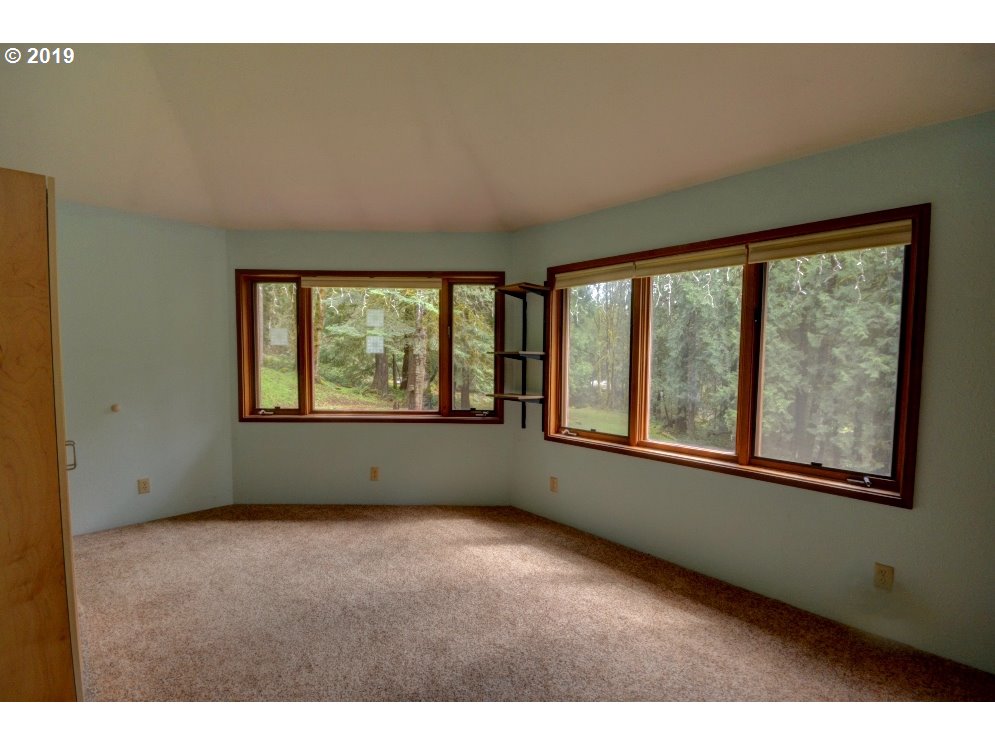 65333 East Barlow Trail Road Rhododendron, OR 97049 - Photo 16 of 31 a view of an empty room with a window