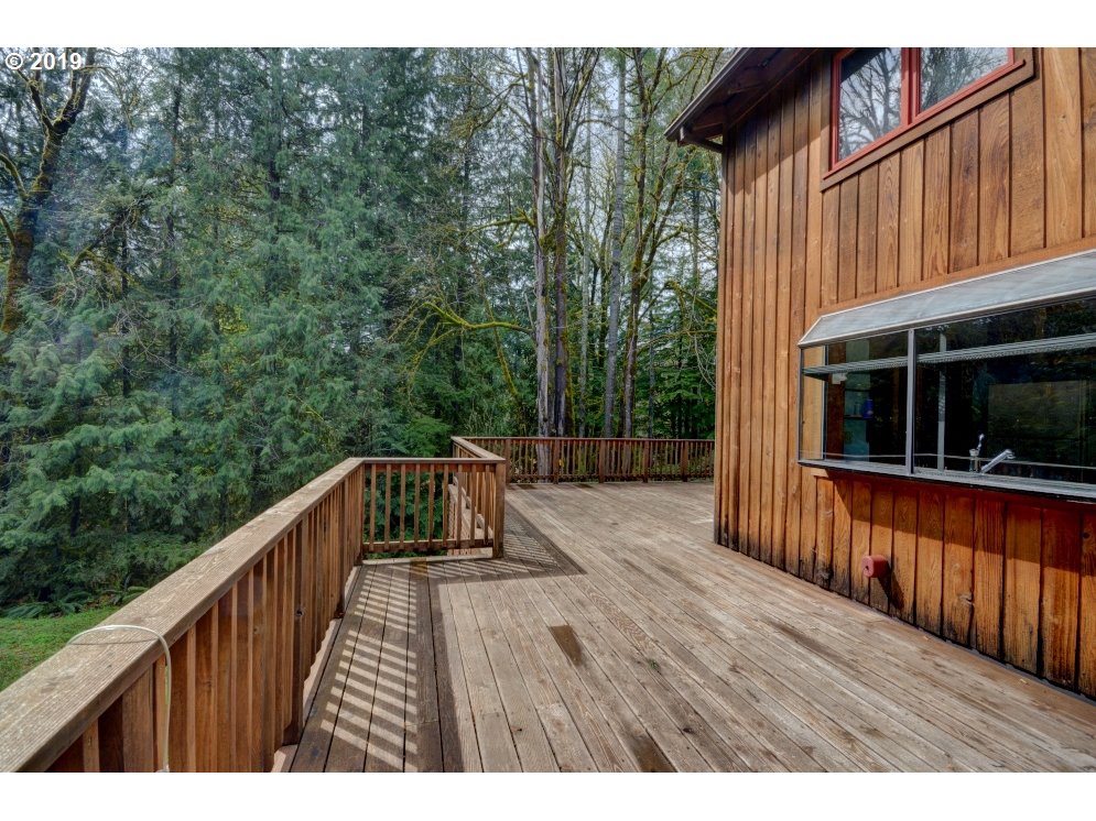 65333 East Barlow Trail Road Rhododendron, OR 97049 - Photo 29 of 31 a balcony with wooden floor and outdoor space