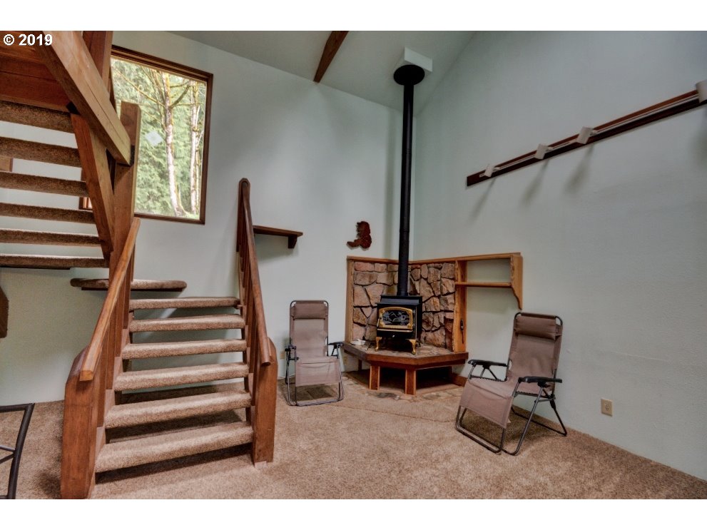 65333 East Barlow Trail Road Rhododendron, OR 97049 - Photo 7 of 31 a living room with furniture and a window