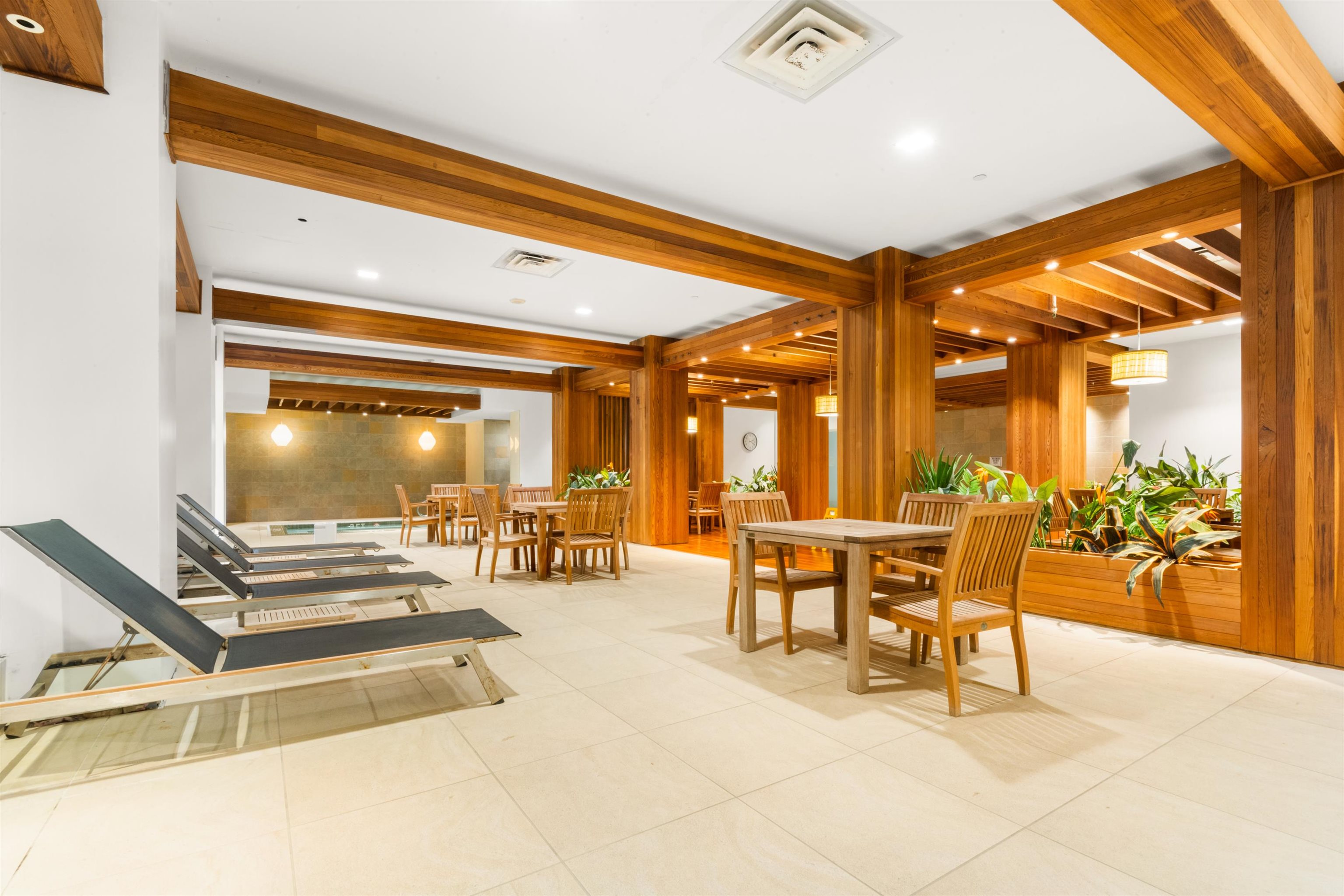 4 Beacon Way, Unit 301 Jersey City, NJ 07304 - Photo 11 of 26 a view of a dining hall with furniture and large windows