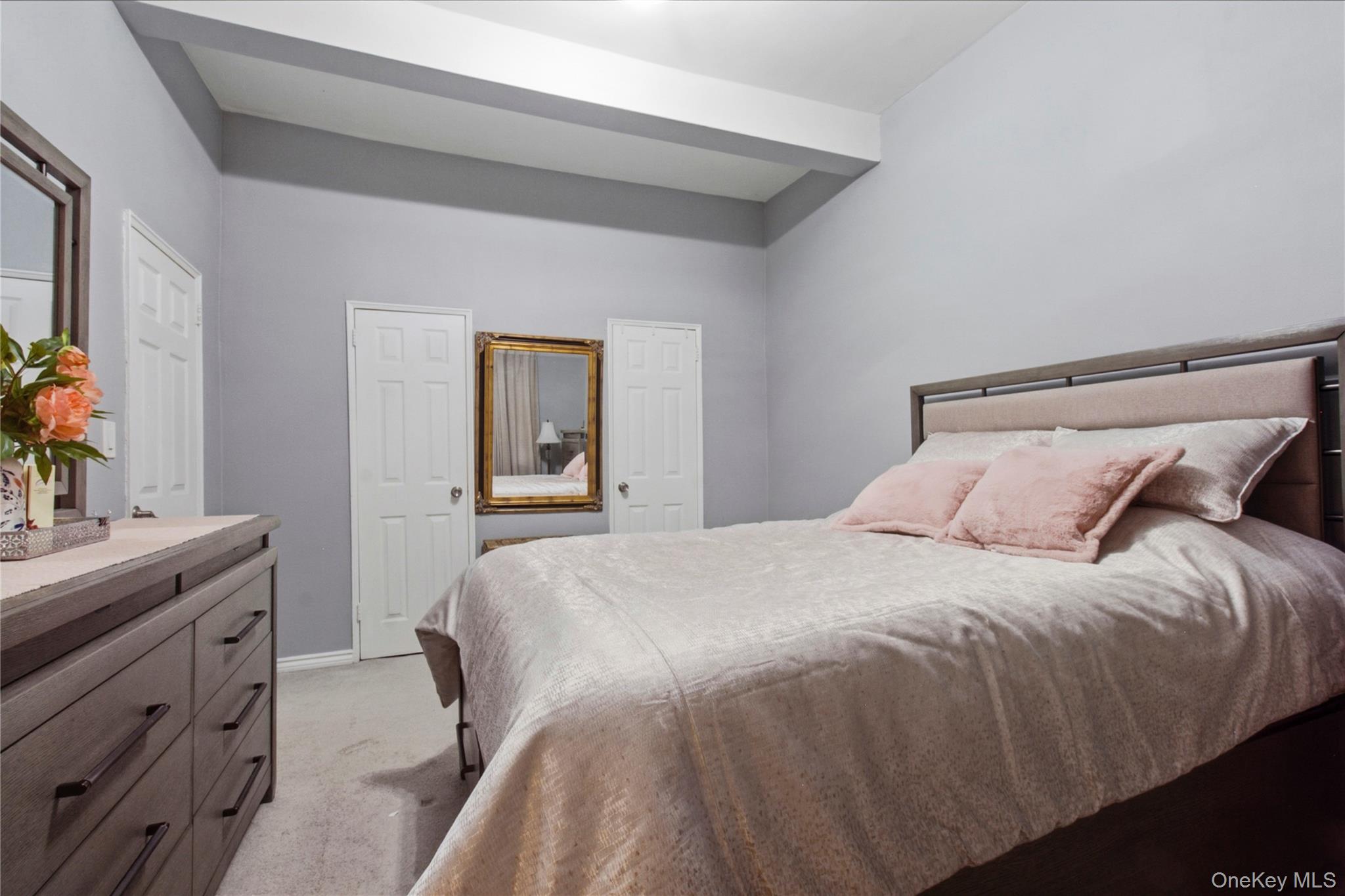 245 Rumsey Road, Unit 2S Yonkers, NY 10701 - Photo 18 of 21 a bedroom with a bed and a dresser
