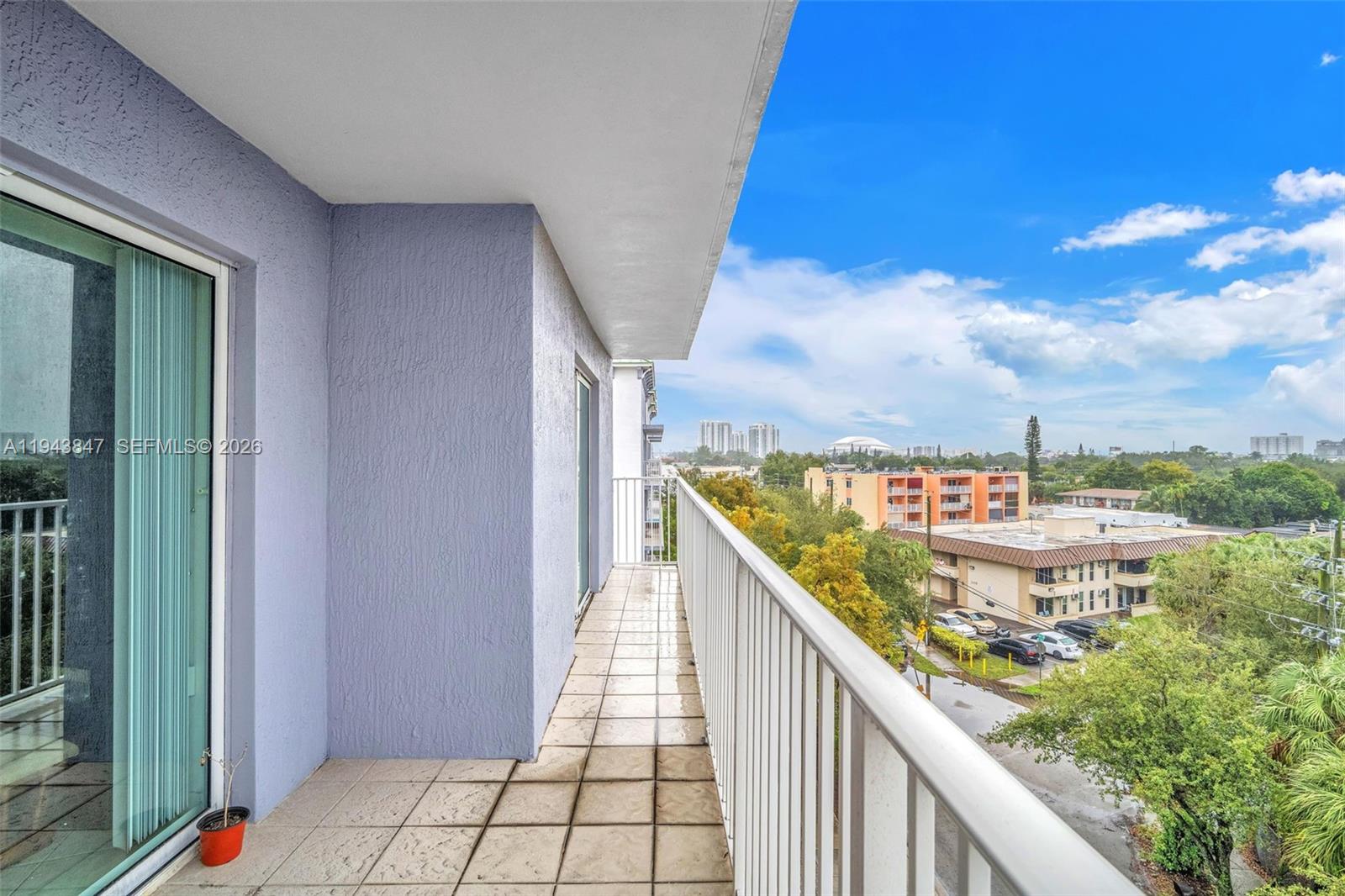 2475 Northwest 16th St Road, Unit 601 Miami, FL 33125 - Photo 12 of 26 a view of balcony with furniture