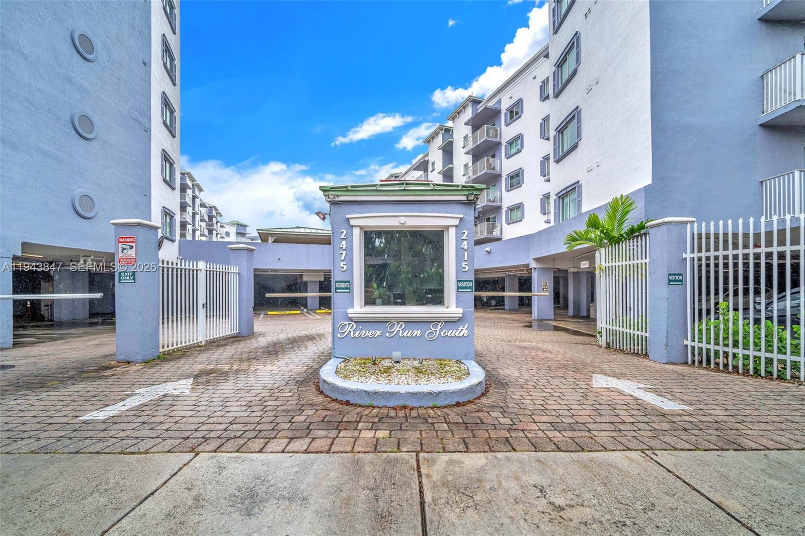 2475 Northwest 16th St Road, Unit 601 Miami, FL 33125 - Photo 17 of 26 a view of a house with a yard