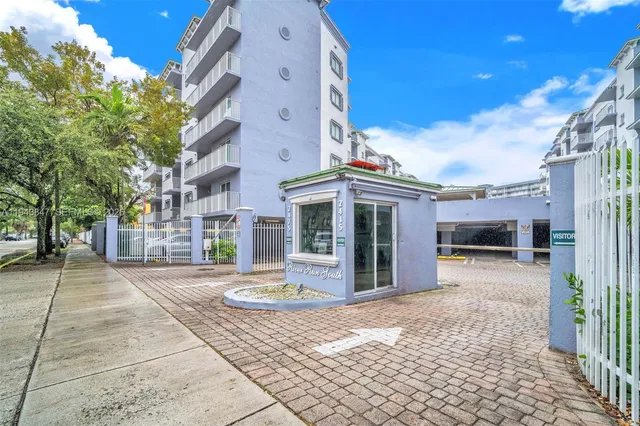 a front view of a building with a porch