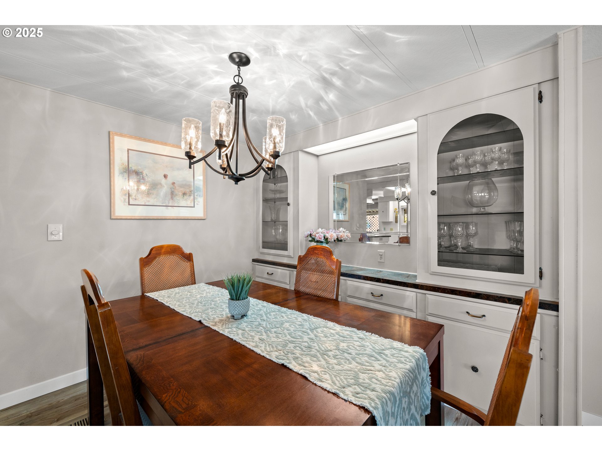 3405 Southeast Vineyard Road, Unit 49 Milwaukie, OR 97267 - Photo 19 of 43 a view of a dining room and hall with furniture