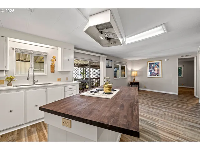 a view of a kitchen and living room