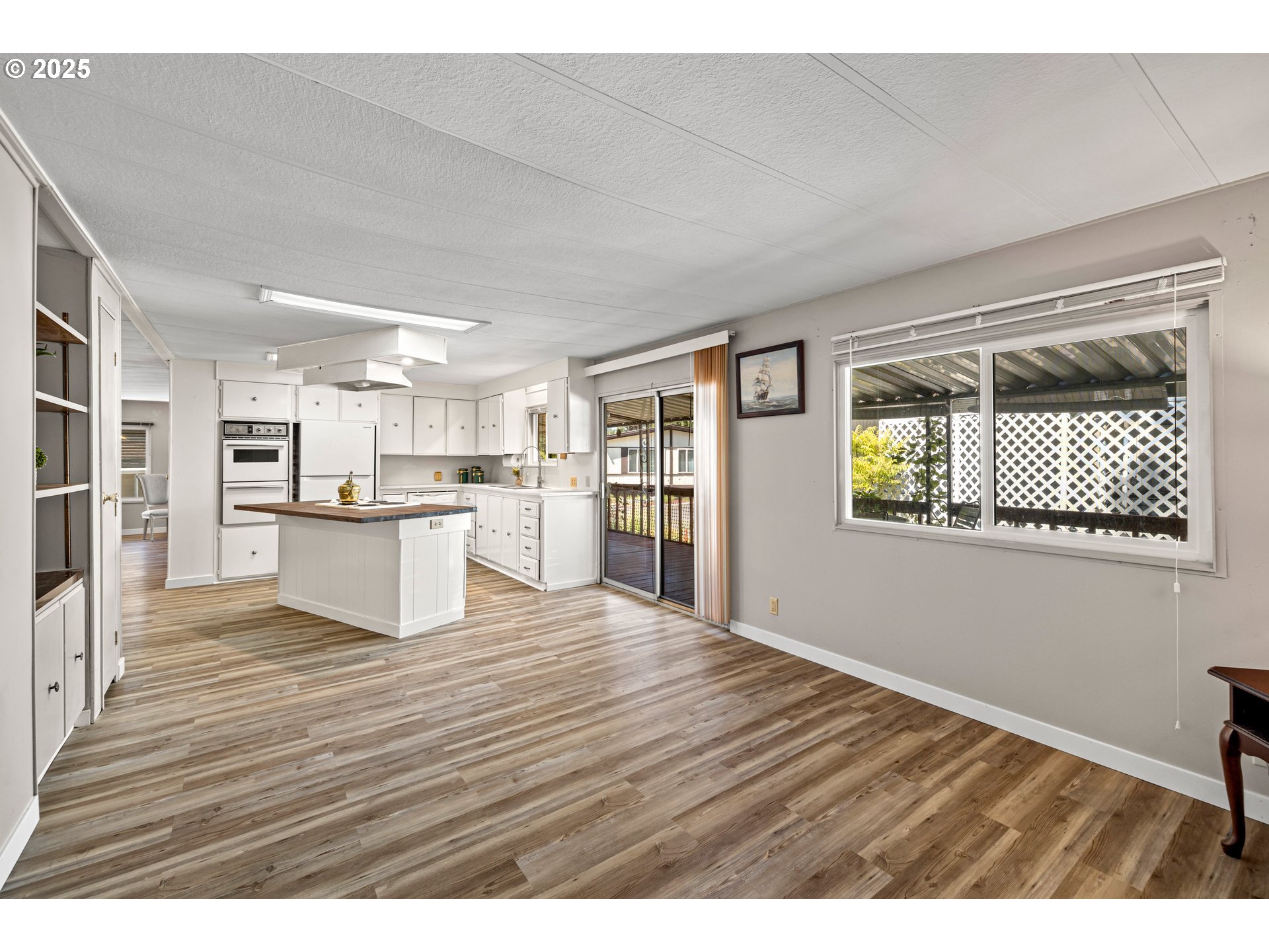 3405 Southeast Vineyard Road, Unit 49 Milwaukie, OR 97267 - Photo 28 of 43 a view of kitchen with wooden floor