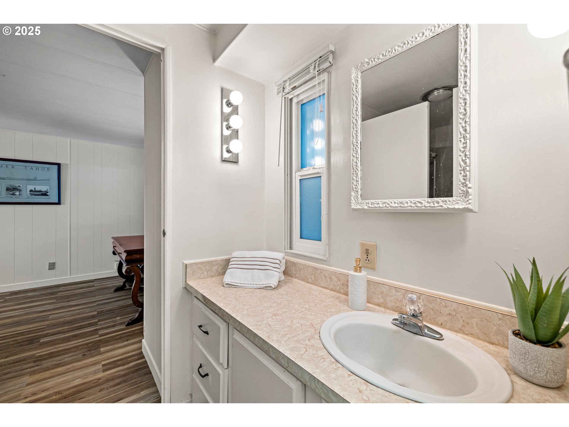 3405 Southeast Vineyard Road, Unit 49 Milwaukie, OR 97267 - Photo 30 of 43 a bathroom with a sink and a mirror