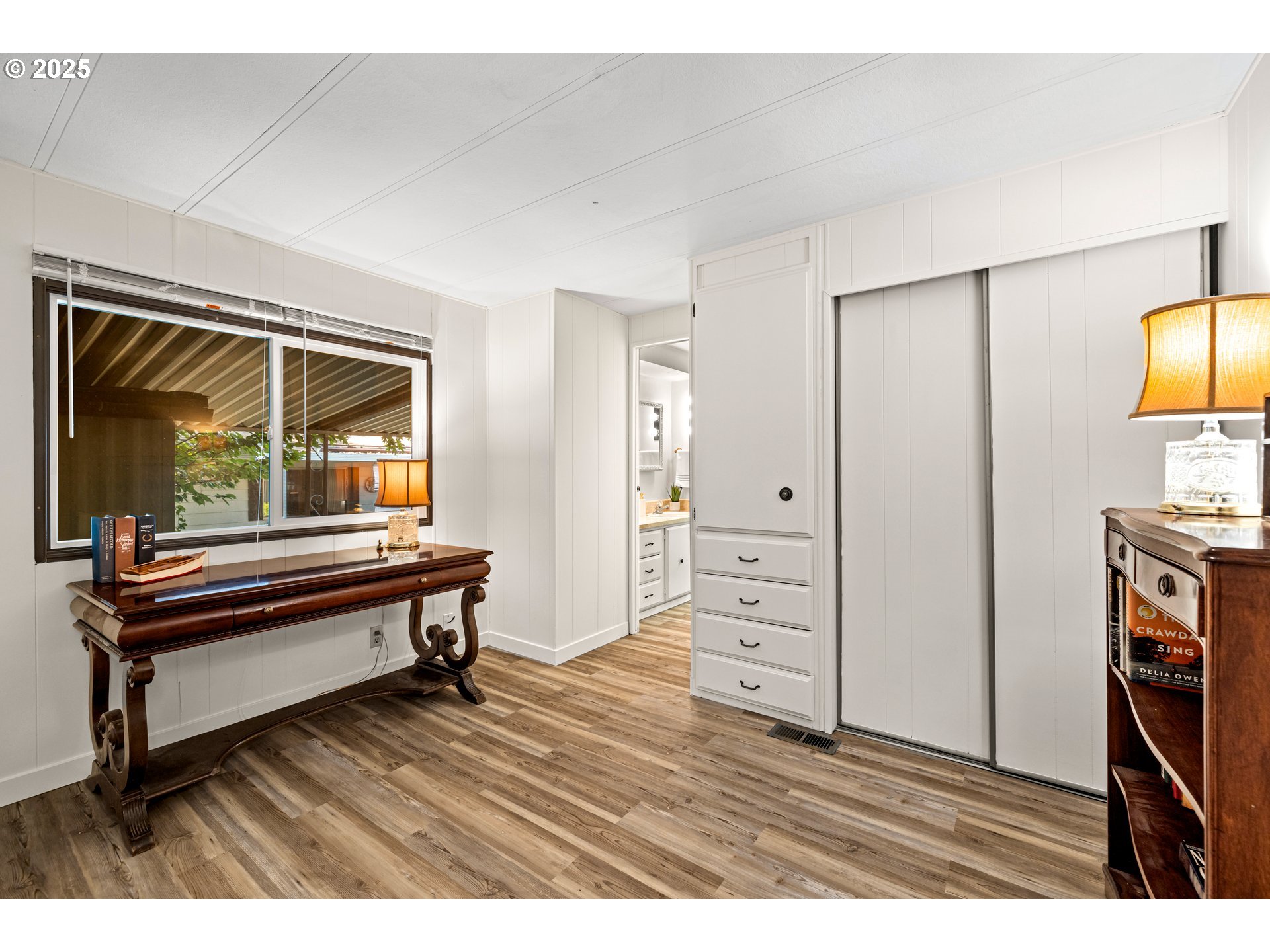 3405 Southeast Vineyard Road, Unit 49 Milwaukie, OR 97267 - Photo 31 of 43 a living room with furniture and a wooden floor