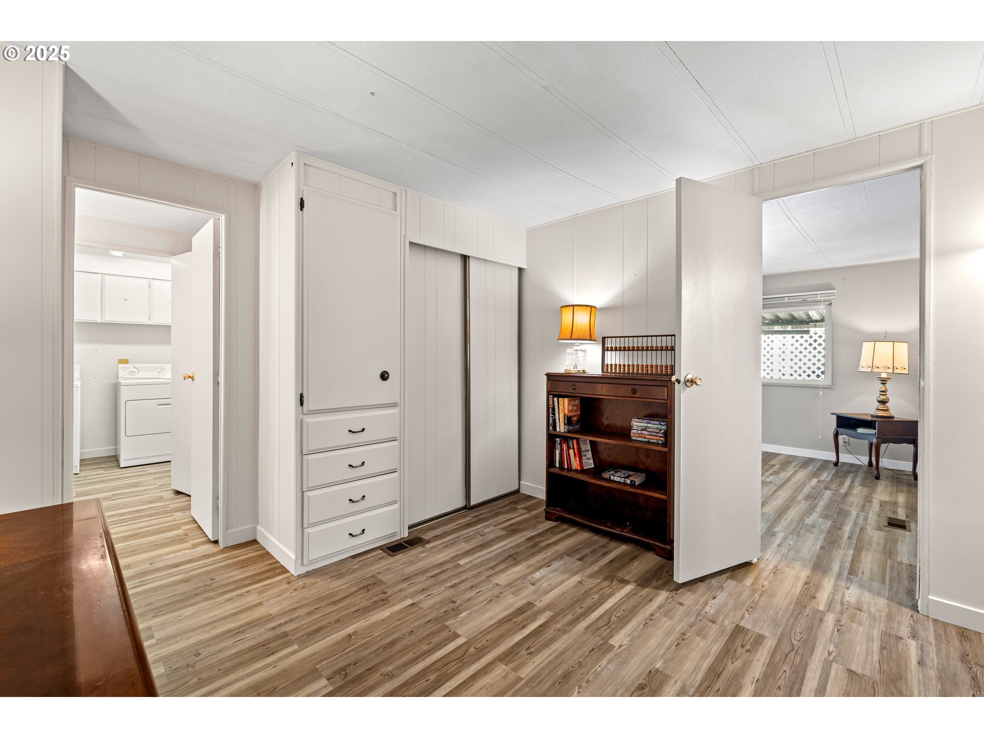 3405 Southeast Vineyard Road, Unit 49 Milwaukie, OR 97267 - Photo 32 of 43 a view interior of kitchen and hall with wooden floor