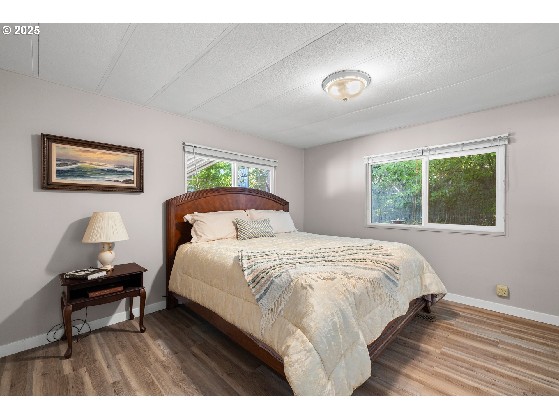 3405 Southeast Vineyard Road, Unit 49 Milwaukie, OR 97267 - Photo 34 of 43 a bedroom with a bed and a desk