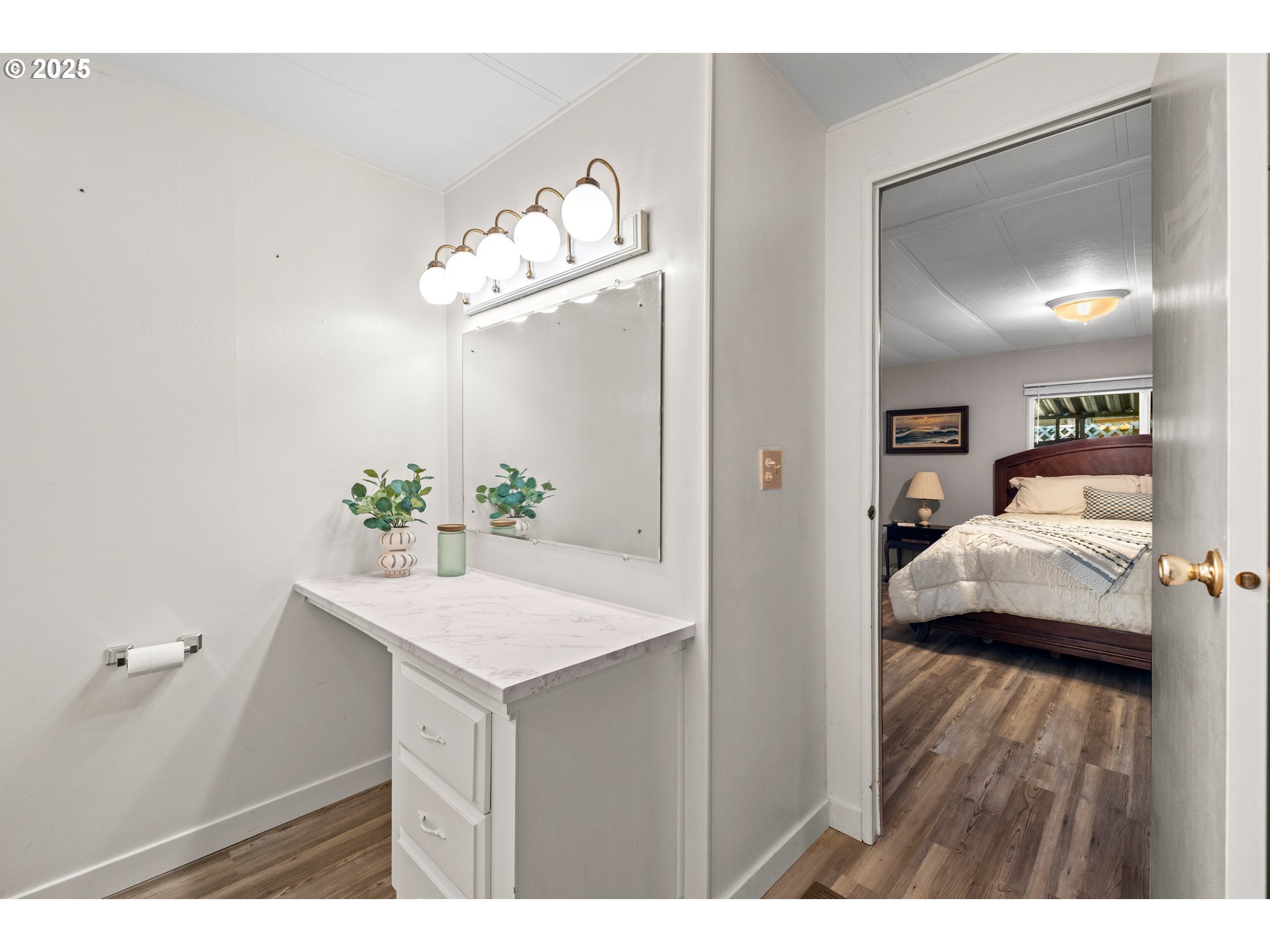 3405 Southeast Vineyard Road, Unit 49 Milwaukie, OR 97267 - Photo 39 of 43 a view of livingroom with kitchen island furniture and wooden floor