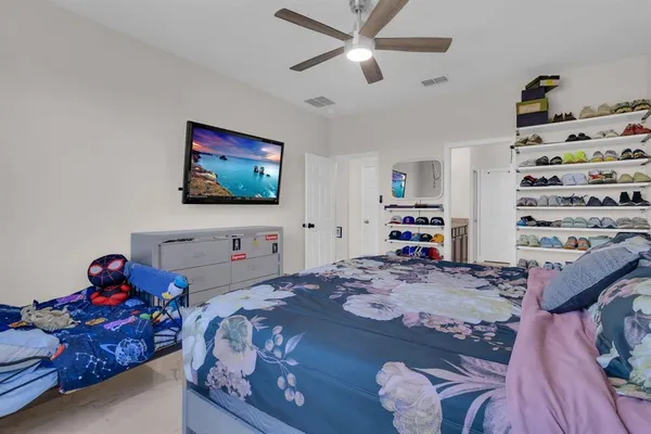 a utility room with sink dryer and washer