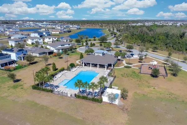 a view of a house with swimming pool
