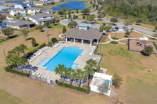 a view of swimming pool with a lake view