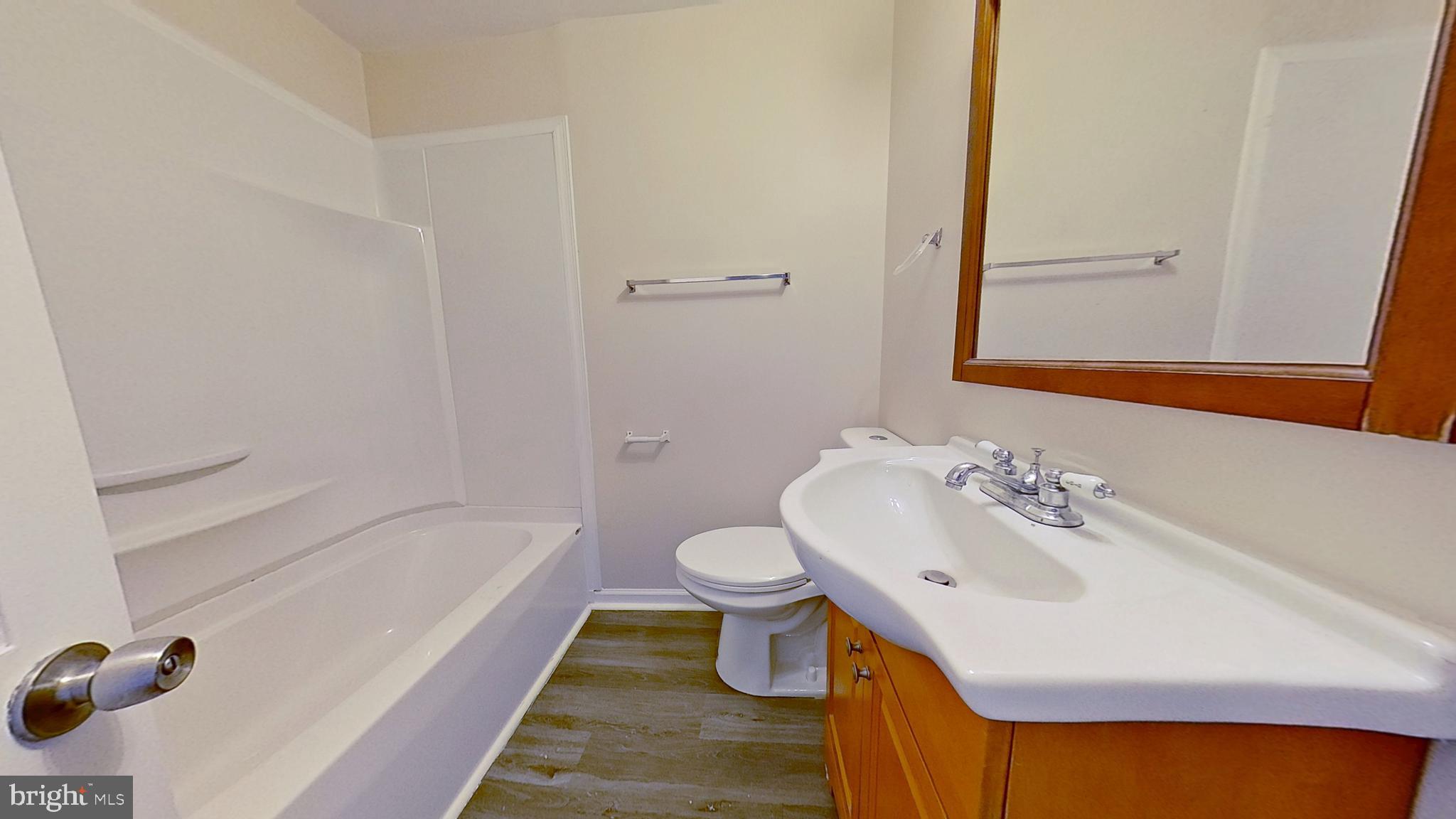 43 South East Street Spring Grove, PA 17362 - Photo 9 of 9 a bathroom with a sink and a mirror