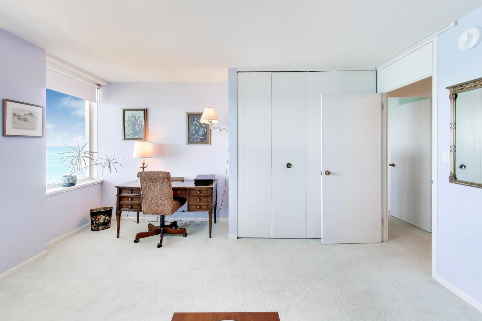 1630 Sheridan Road, Unit 7K Wilmette, IL 60091 - Photo 21 of 28 a view of a workspace with furniture and a window