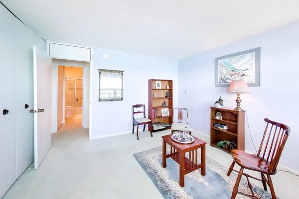 a view of a livingroom with furniture and window