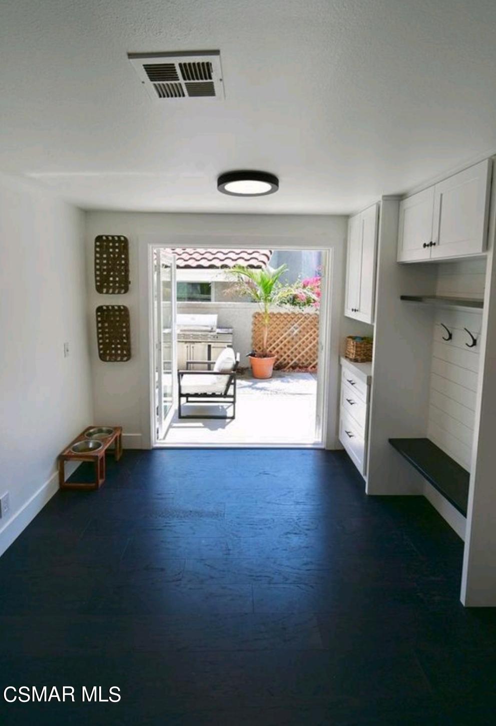 979 Thistlegate Road Oak Park, CA 91377 - Photo 11 of 19 a view of a livingroom with furniture hardwood floor and a ceiling fan
