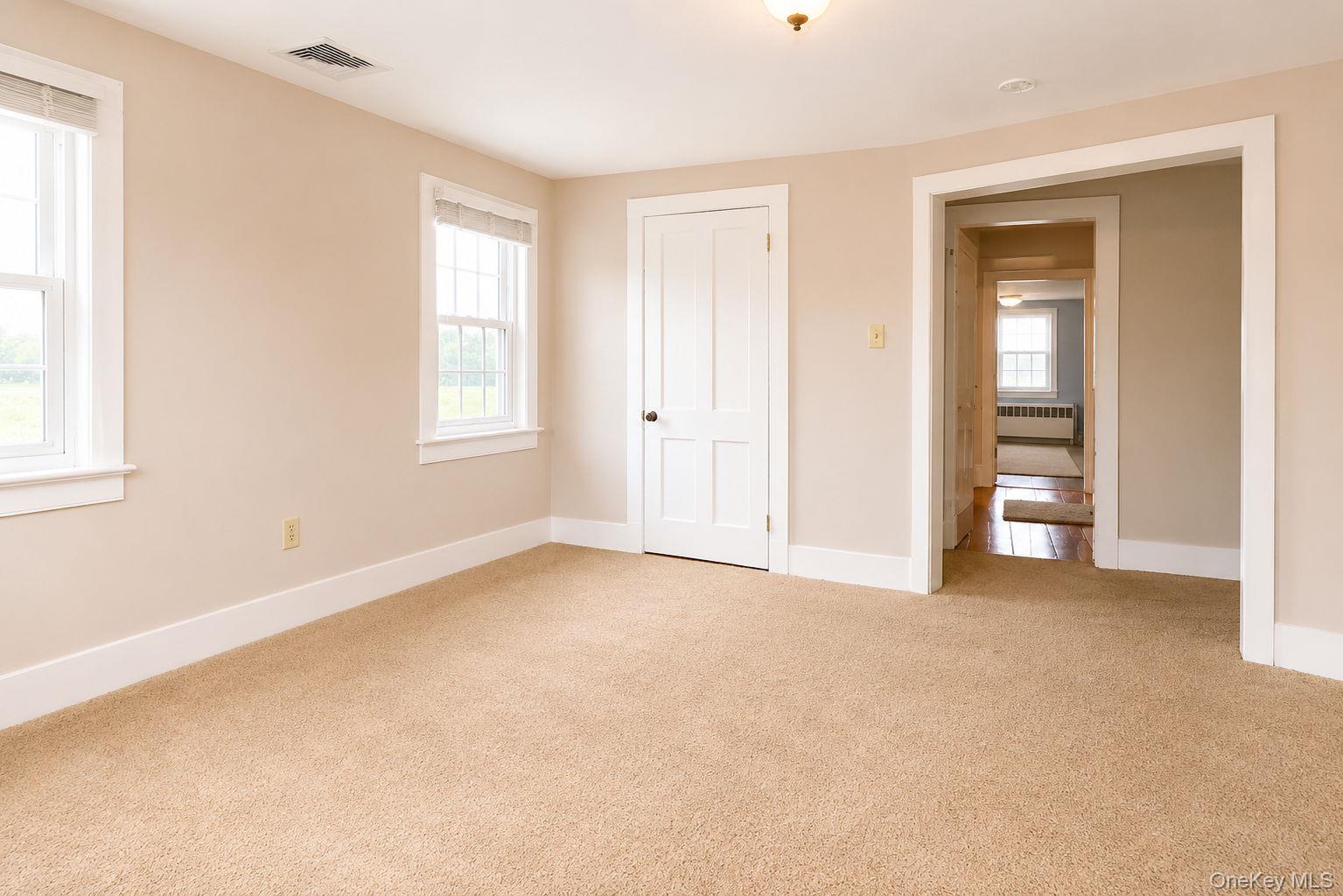 340 Dunn Road Montgomery, NY 12549 - Photo 30 of 34 Spacious bedroom with carpeted flooring, natural lighting and freshly painted walls