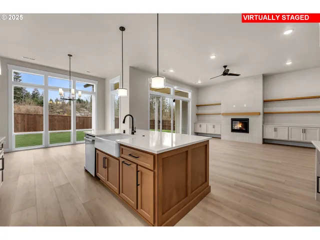 a kitchen that has a lot of cabinets in it